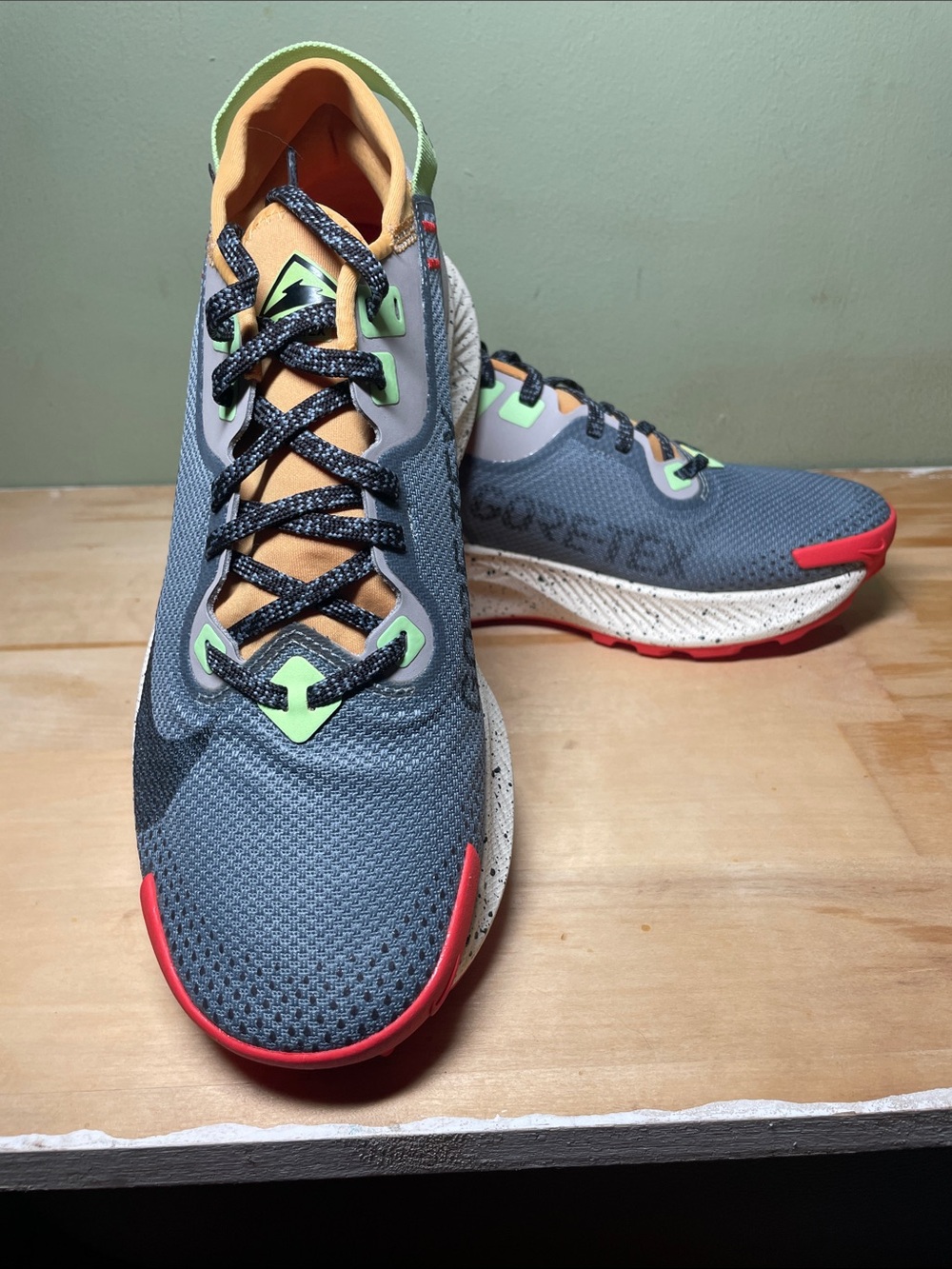 Nike Grey Trail Running Shoes with Green Accents and Red Soles - Picture 2 of 5